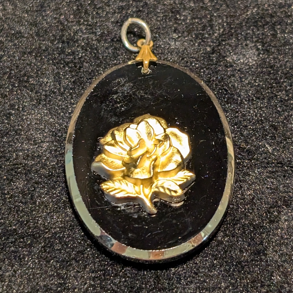 Elegant Black and Gold Rose Pendant